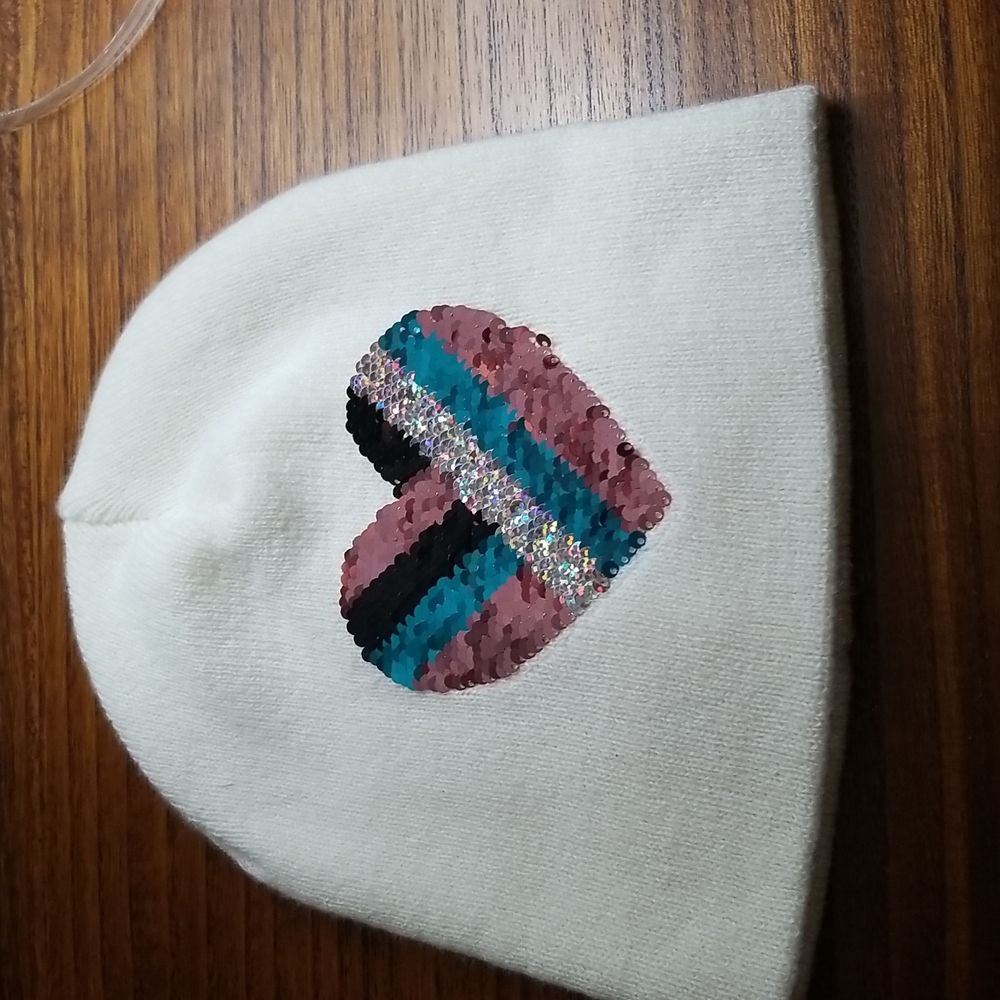 Belle DuJour reversible sequence heart stocking cap